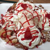 Funnel Cake · Delicious warm homemade recipe funnel cake served with powdered sugar, 1 scoop of your favor...