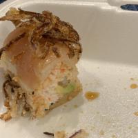Chef's Albacore Roll · Soy paper. Inside: shrimp tempura, krab mix, avocado and cucumber. Outside: albacore and cri...