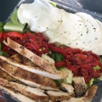 Chicken Napolitano Salad · Breaded chicken over iceberg lettuce with fresh mozzarella, roasted peppers served with bals...