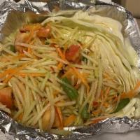 Papaya Salad · Papaya, carrot, green beans, tomatoes in spicy garlic lime dressing.