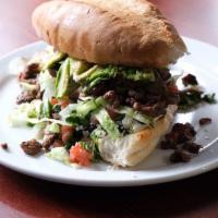 Chimichurri Bistec Torta · Grilled steak con chimichurri, lettuce, tomato, mayonesa, avocado, onions, cilantro, queso f...