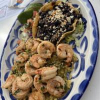 Tequila Lime Shrimp · Shrimp sauteed with tequila, lime, butter and seasoned with garlic, spicy crushed chili and ...