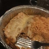 Enchiladas · Two enchilada served with choice of meat or cheese served with a side of rice and beans
