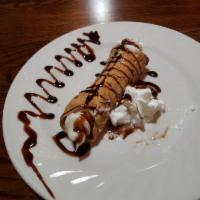 Cannoli · Crispy cannoli shell filled with a smooth mixture of fresh whole ricotta and mini chocolate ...