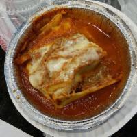 Meat Lasagna · Lasagna topped with classic cheese, tomato sauce, and ground beef.