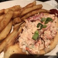 Lobster Roll · Chilled lobster meat mixed with minced celery, onions, herbs, lemon juice and mayo on a long...