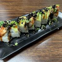 Dragon Roll · 8 pieces. Shrimp tempura, crabmeat, cucumber top with avocado, unagi, unagi sauce and sesame.