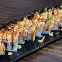 Wow Roll · 8 pieces. Shrimp tempura, cucumber top with salmon, spicy crab, spicy mayo, unagi sauce, tob...