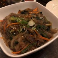 Jap Chae · Pan-fried glass noodles with vegetables, beef, and mushrooms. Portion for 2