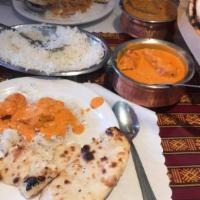 Butter Chicken · Boneless tandoori chicken cooked with cashew nuts, tomato, onion and spices in rich creamy s...