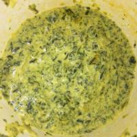 Saag Paneer · Fresh spinach and paneer cooked with garlic, onion, ginger and spices.
(Naan bread recommend...