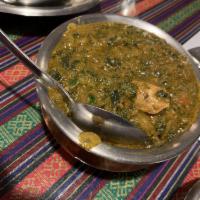 Chicken Saag · Boneless chicken cooked with spinach, onion, ginger, tomatoes and spices.
(Naan bread recomm...