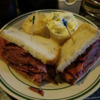 Hot Pastrami Sandwich · Smoked and cured beef sandwich. 