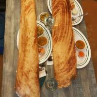 Paper Masala Dosai · Large crepe filled with potato masala. Made with rice flour, lentils and semolina. Served wi...