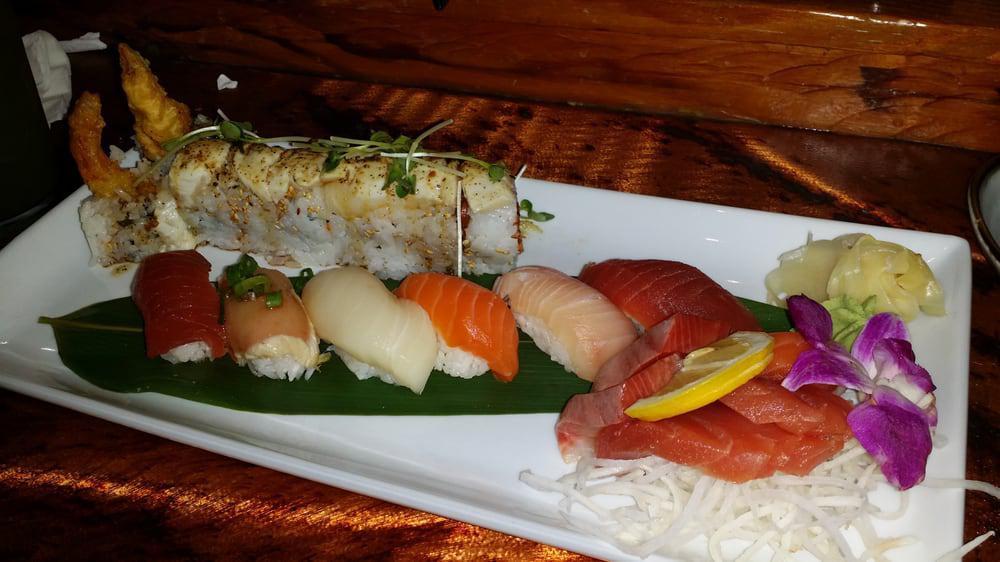 Sashimi · 4 piece choice of tuna, salmon or yellowtail.