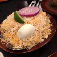 Paradise Special Chicken Biryani · One of the prime biryani made of long grain basmati rice cooked with succulent pieces of fri...