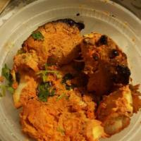 Chicken Tikka · Juicy chunks of chicken marinated in Punjabi blend and cooked in a clay oven for its smoky f...