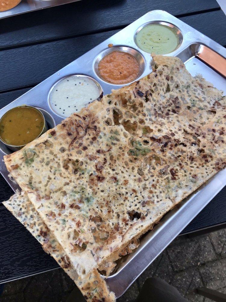 Onion Masala Dosa · Thin rice and lentil crepe filled with potatoes and onion. Served with 3 varieties of chutneys and sambar.