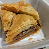 Baklava · Layers of phyllo pastry and walnuts, soaked in honey syrup