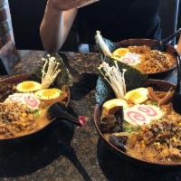 Miso Ramen Bowl · 7 Hour chicken broth, Miso Soup Base, Chopped Pork, Cabbage, Corn, Soft Boiled Egg, Scallion...