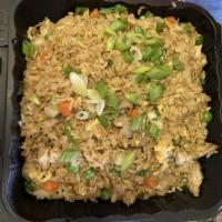 Chicken Fried Rice · Fried Rice stir fried with Chicken, peas, carrots, brown and green onions
