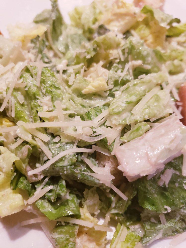Caesar Salad · Crisp romaine, aged parmesan, croutons and Caesar dressing.