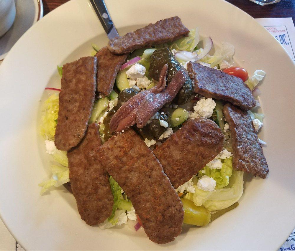 Greek Salad · Tossed salad with imported greek olives, anchovies, and feta cheese on a bed of greens with Greek dressing. Add-ons for an additional charge.