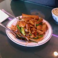 Mongolian Chicken · Tender sliced chicken with scallions and white onion.