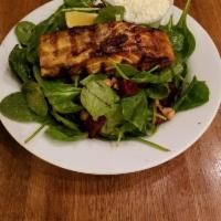 Grilled Salmon · Over sauteed spinach and feta.