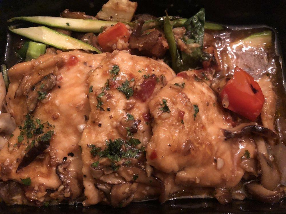 Chicken Marsala · Pan-seared chicken with mixed mushrooms in a Marsala demi sauce served with seasonal vegetables and fingerling potatoes.