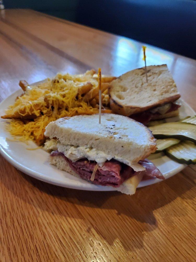 Reuben · Corned beef, sauerkraut, Swiss, and Thousand Island dressing on grilled rye bread. Recommended by Eileen.