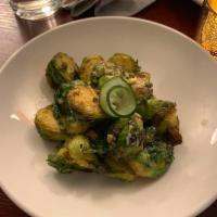 Bombay Brussels · Fresh Brussels sprouts, oven roasted and tossed in creamy mustard sauce. Gluten free.