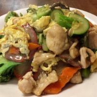 Chicken Chow Fun · Stir fried noodles with vegetables. Fresh rice fun noodle, sliced chicken breast, onions and...