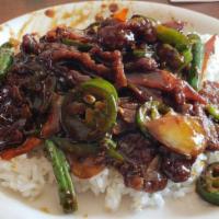 Mongolian Beef · Sliced beef flank steak, stir fry with jalapeno, bell pepper, green bean, yellow onion and c...