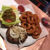 Cajun Burger · 100% fresh ground Angus beef with Cajun spices, grilled onions, lettuce, tomato, jalapeno an...