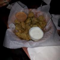Frickles · Flash fried dill pickle chips served with choice of dipping sauce.