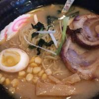 Spicy Miso Ramen · Spicy Miso flavored 
2 slices of pork belly, half a soft-boiled egg, 2 slices of fish cake, ...