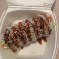 Renegade Roll · Tempura fried jalapeno stuffed with cream cheese, salmon and cucumber with sweet sauce. Spicy.