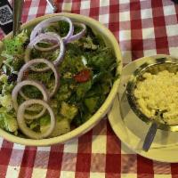 Mediterranean Salad · Romaine lettuce, cucumbers, tomatoes, Kalamata olives, feta cheese, red onion, vinaigrette d...