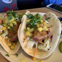 Seared Ahi Tacos · Flour tortillas, pineapple salsa, cabbage slaw, chipotle mayo and 3 bean chili.