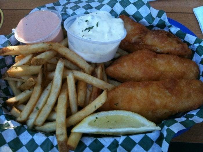 Fish and Chips · Three arctic cod fillets lightly battered and deep fried. Served with tartar sauce, fries or tots.