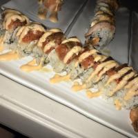 El Chapo Roll · In shrimp tempura, cucumber, avocado, and crab meat. Out spicy tuna and albacore.
