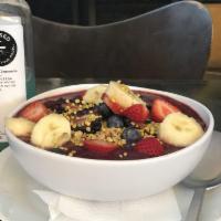 Acai Bowl · Organic granola, acai berry smoothie, fresh sliced banana, and mix berries, bee pollen.