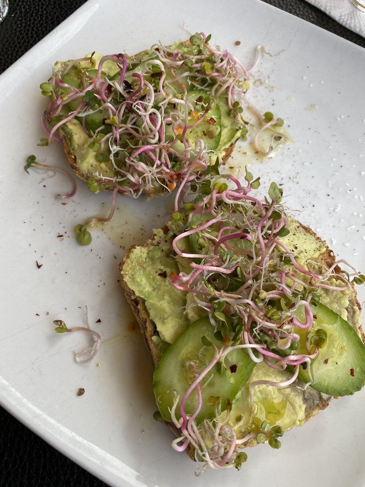 Avocado Toast · 2 Pcs Toasted multigrain bread, mashed avocado, cucumber, sprouts, and crushed red pepper.
