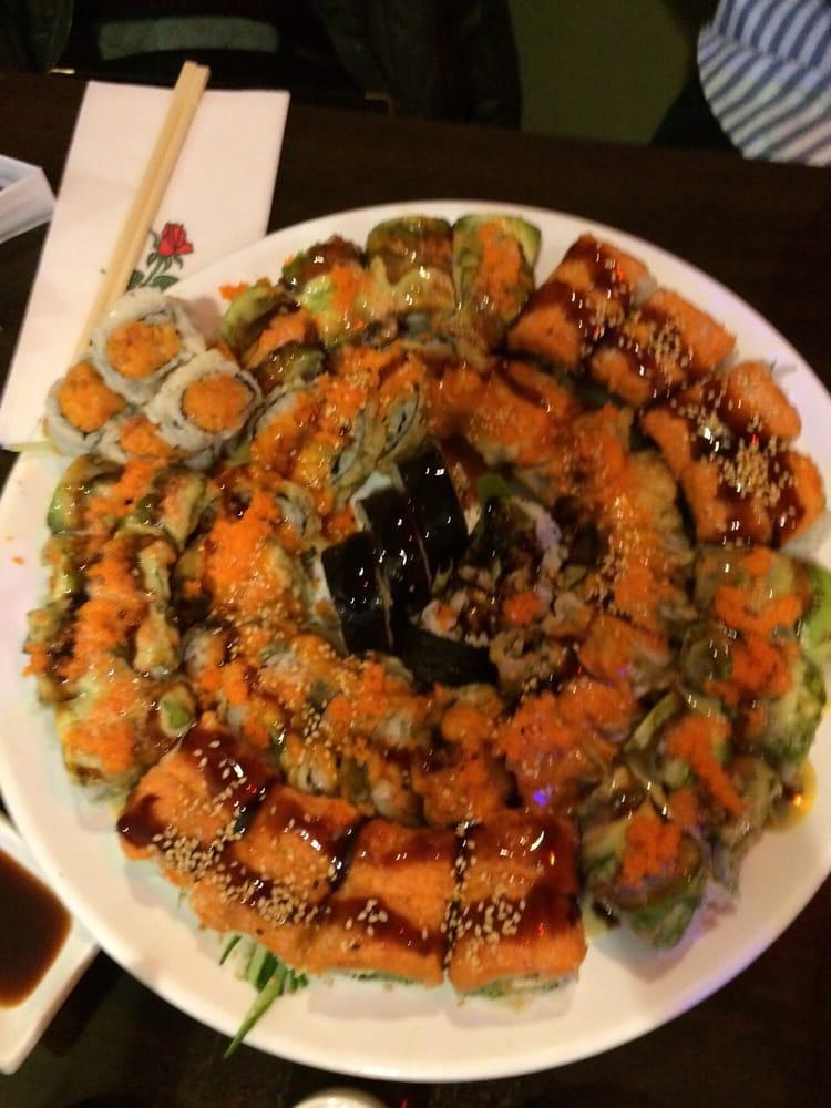 6 Piece Godzilla Roll · Tempura spicy tuna, avocado on top with masago, scallion and chef's special sauce.