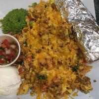 Santa Fe Scramble · Chorizo or vegetarian chorizo, diced green onions, tomatoes, cilantro and corn tortilla stri...