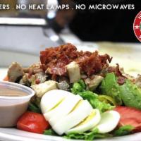 Cobb Salad · The king of salads with a grilled chicken breast or cold turkey! Crispy bacon, fresh, Bonsal...