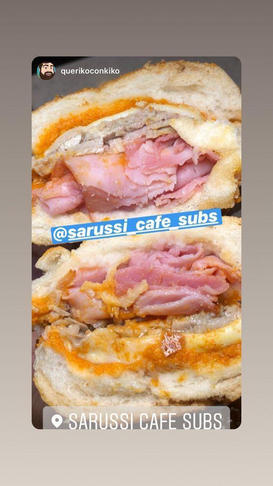 Sarussi Original Sandwich · Smoked ham, roasted pork leg, mozzarella cheese, pickles and house sauce. Sandwiches are prepared with a bit of garlic butter over the bread. 