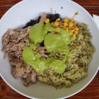 Carnitas Bowl · Shredded pork. Choice of base, pickled onions, corn salsa, avocado sauce and cilantro. Brown...