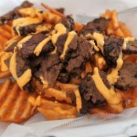Vegan Waffle Fries Combo · Waffle fries served with chili vegan mayo. Combos served with extra waffle fries and soft dr...